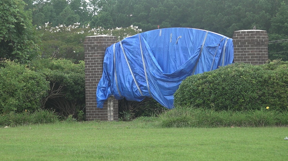 wrapped sign at closed hospital